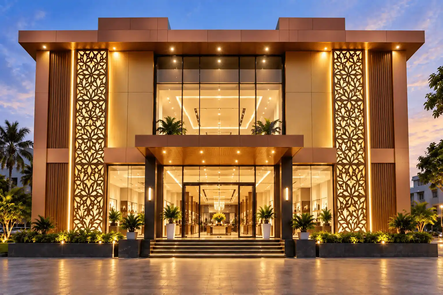 Backlit CNC jali ACP panels on commercial showroom elevation in Tamil Nadu