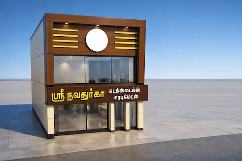 Modern storefront design showcasing the seamless transition between metallic ACP wall cladding and large-format frameless glass systems in coimbatore