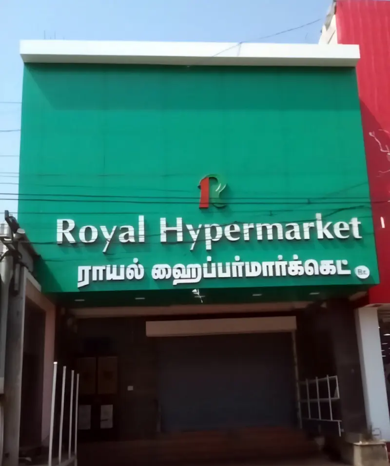 ACP exterior cladding work on a commercial building in Tenkasi